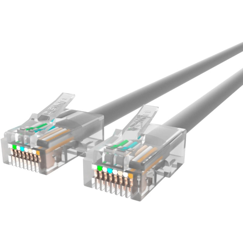 Close-up view of gold-plated RJ45 connectors showing internal wiring and pin configuration of CAT5e cable