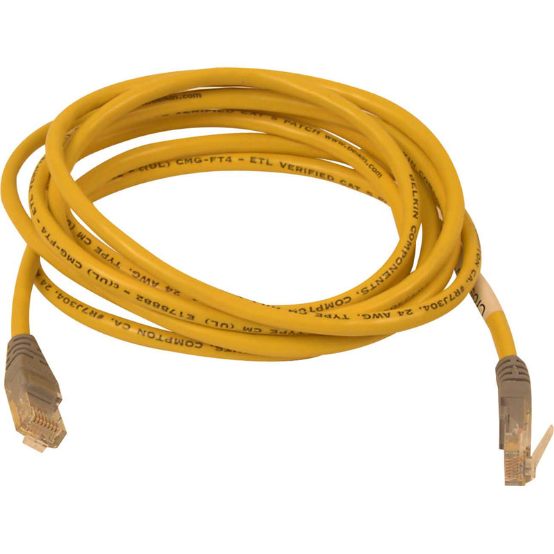 Yellow Belkin Cat5e crossover cable with RJ-45 connectors and molded strain relief, coiled view showing 7-foot length