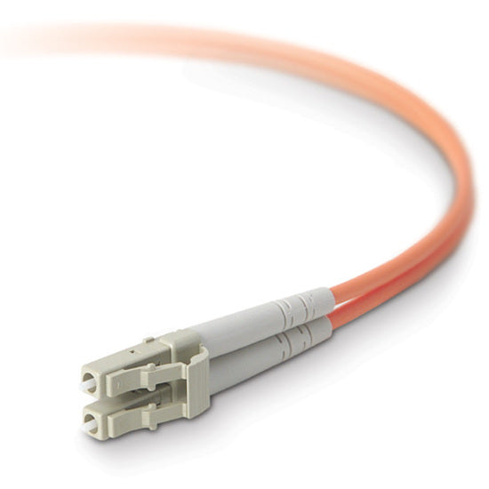 Close-up view of dual LC connector end of Belkin fiber optic cable with orange jacket