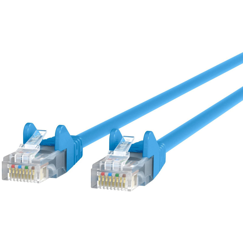 Close-up view of Belkin Cat5e crossover cable showing blue cable with RJ45 connectors and transparent housings