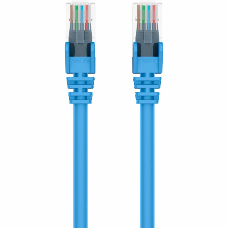 Detail shot of Belkin Cat5e crossover cable connectors showing internal color-coded wiring