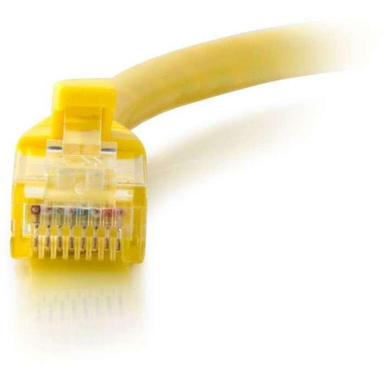 Detailed view of RJ-45 connector pins on yellow Cat5e ethernet cable