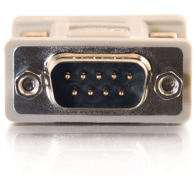 Macro shot of DB9 male connector showing detailed pin layout and metal shield