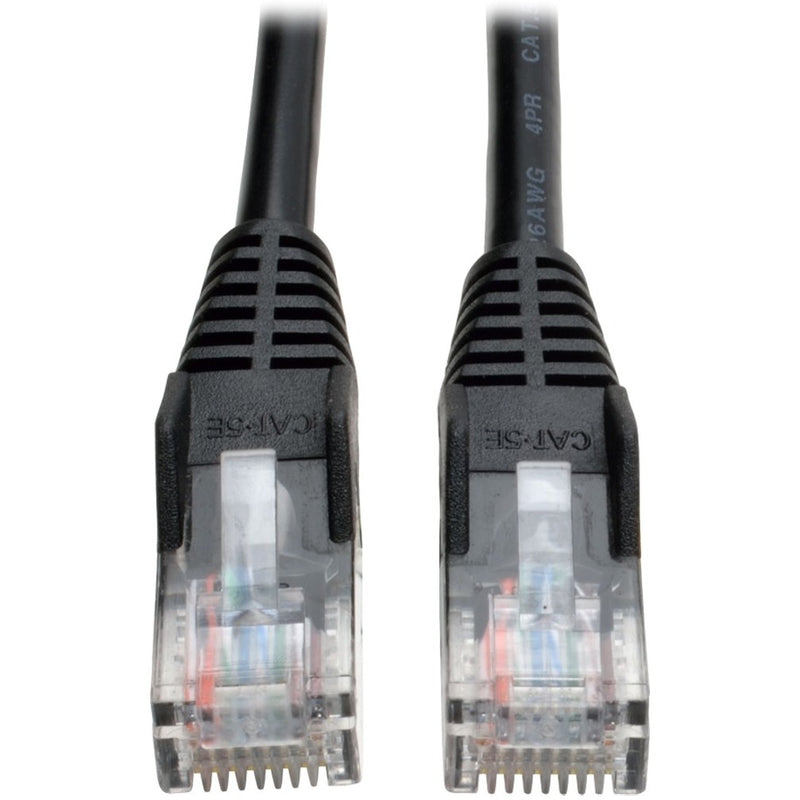 Close-up view of two transparent RJ45 connectors on black Cat5e ethernet patch cable showing internal wiring and snagless tab protection