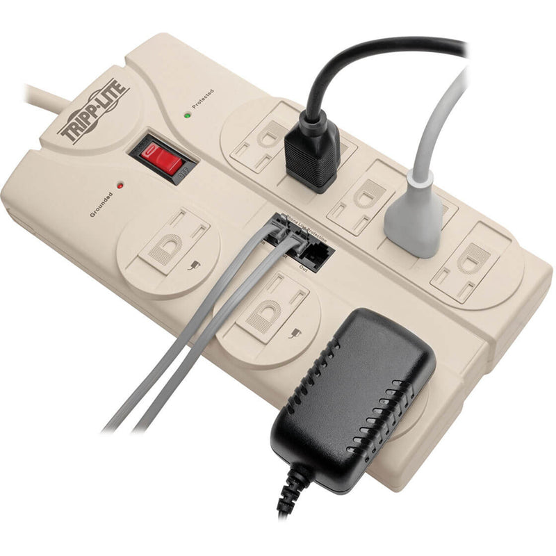 Close-up view of TLP808TEL surge protector with connected devices showing protection features