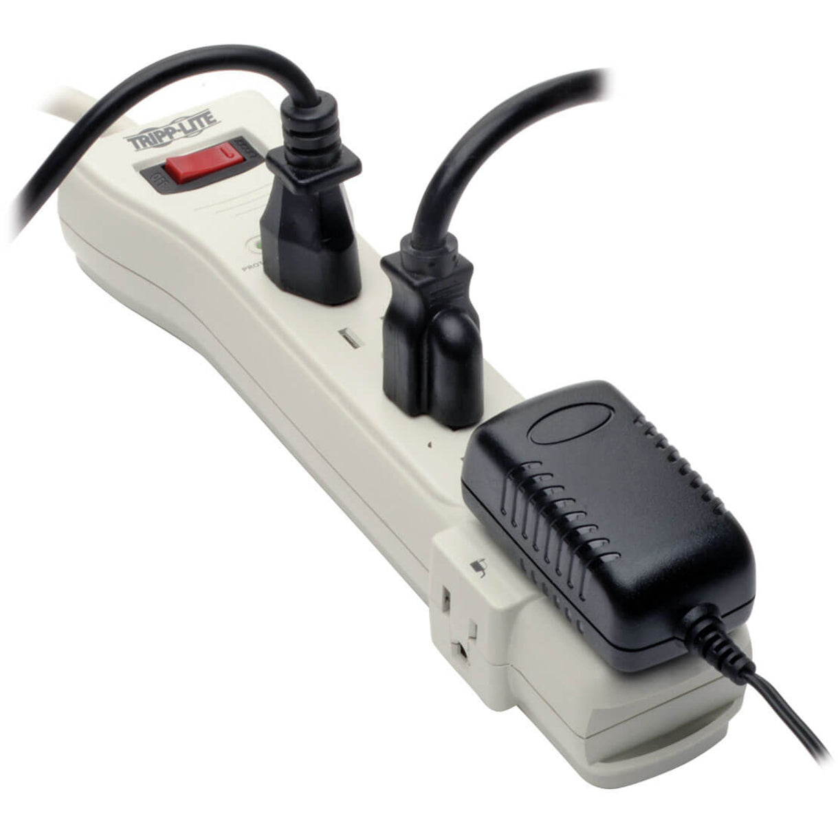 Angled view of Tripp Lite SUPER7 surge protector demonstrating transformer spacing with connected adapters-alternate-image3