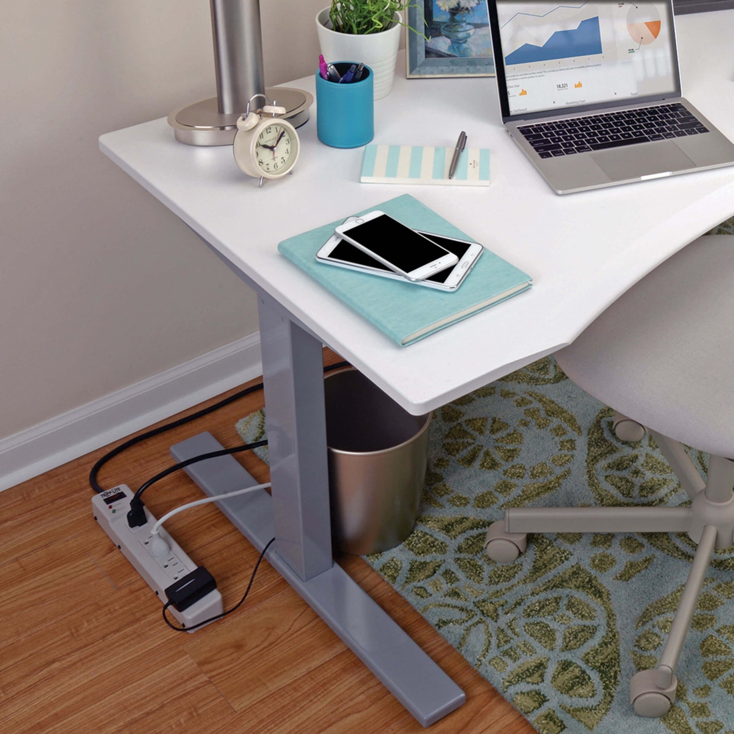 Tripp Lite surge protector installed under a modern desk with connected devices-alternate-image3