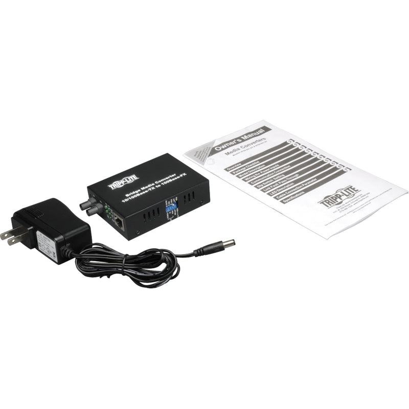 Complete package contents including media converter, power adapter, and manual