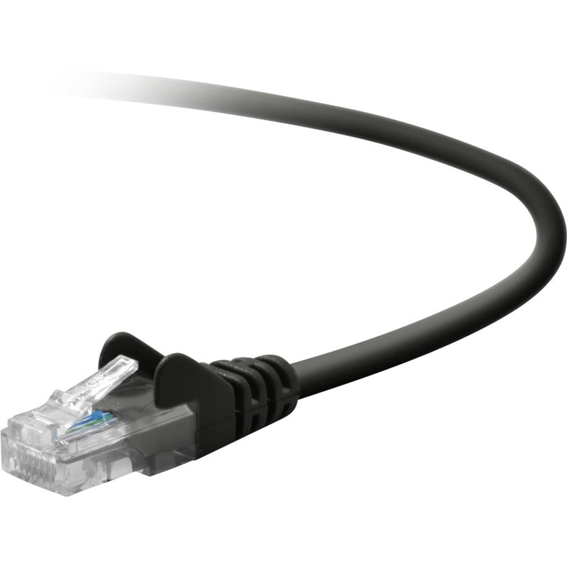 Close-up view of Belkin Cat 5E network cable's snagless RJ-45 connector with transparent housing and black protective boot