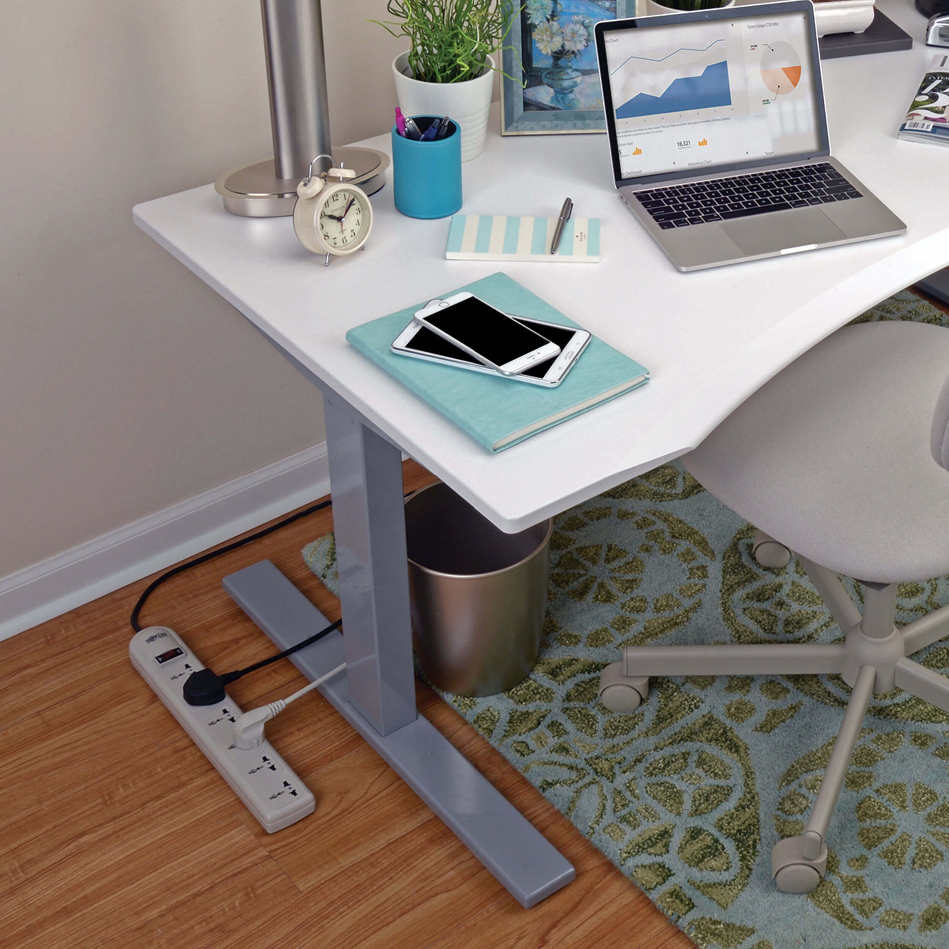 Tripp Lite surge protector in modern office setting with laptop and devices-alternate-image3