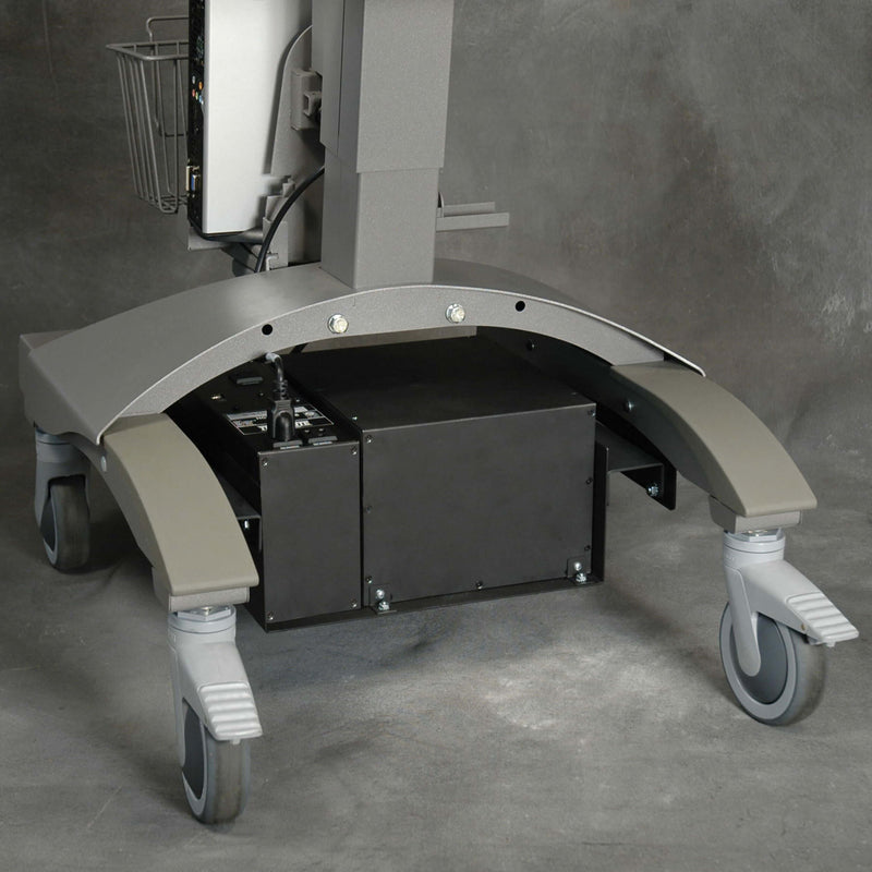 Under-cart view of Tripp Lite HCRK power system installed on medical cart base with mounting brackets