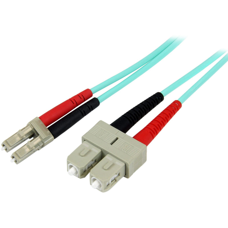 StarTech.com 10Gb aqua fiber patch cable with LC connectors showing both cable ends with red and black strain relief boots