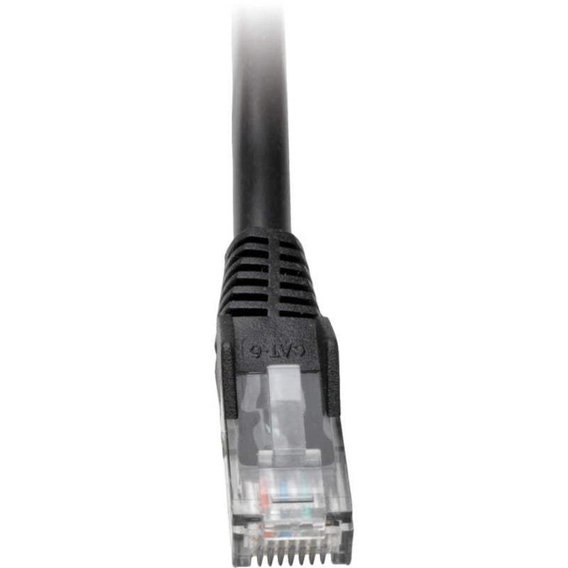 Close-up view of Cat6 cable RJ45 connector with transparent housing and black snagless boot design