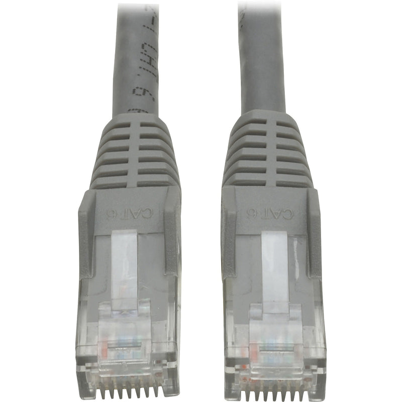 Close-up view of two gray RJ45 connectors with snagless boots and transparent housing on Cat6 cable