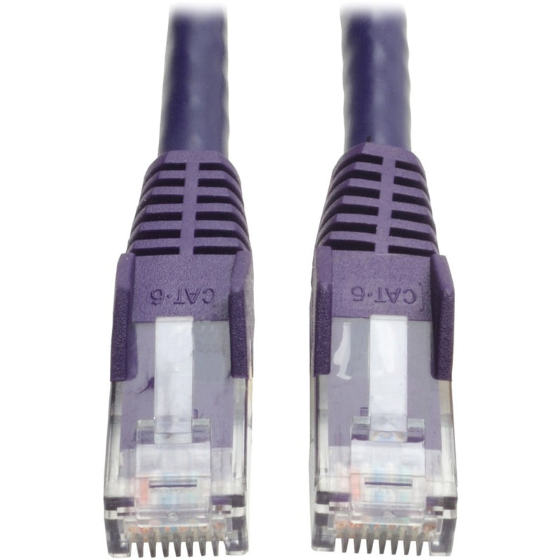 Close-up view of purple Cat6 cable ends showing gold-plated RJ-45 connectors with strain relief boots and clear housing