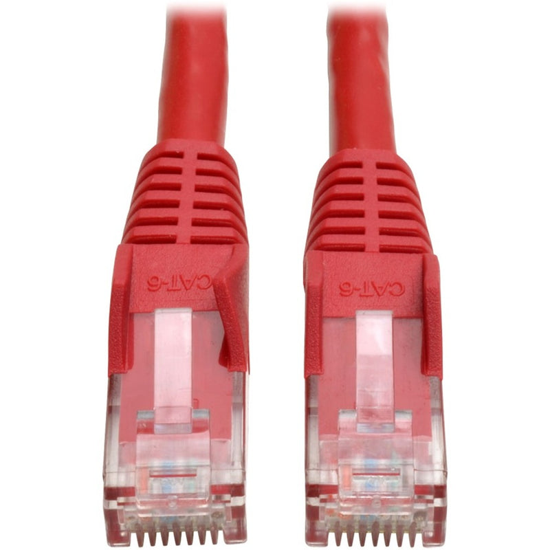 Close-up view of red Cat6 cable RJ-45 connectors with snagless boots and transparent housings