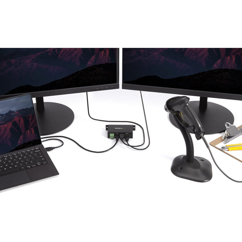 USB hub integrated into a professional workspace with multiple monitors and peripherals