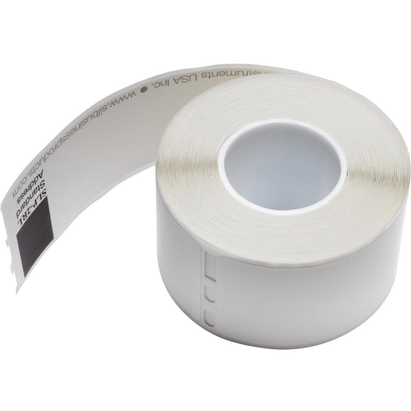 Close-up view of white thermal label roll showing core and label material