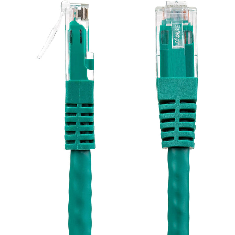 Side view of two green ethernet cable ends showing strain relief design and connector construction