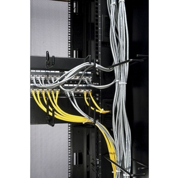 Detailed view of cable organizer showing professional cable routing and management implementation