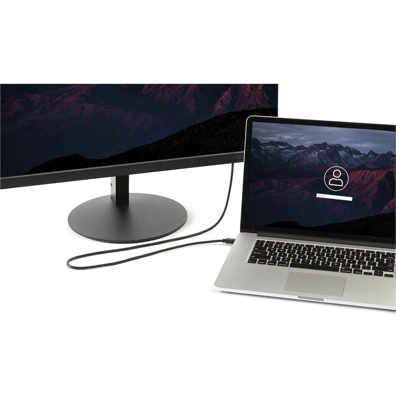 Setup showing laptop connected to 4K monitor via Mini DisplayPort cable