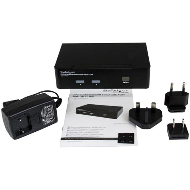 StarTech.com KVM switch package contents including power adapters and manual