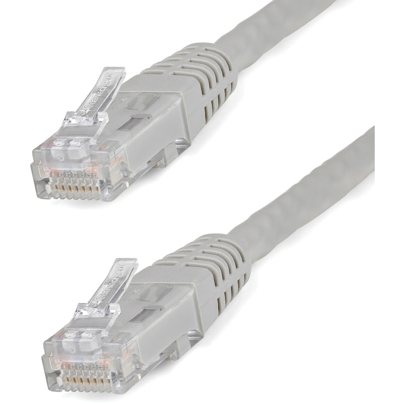 Close-up view of gold-plated RJ45 connectors on gray Cat6 ethernet cable showing transparent housing and pin arrangement