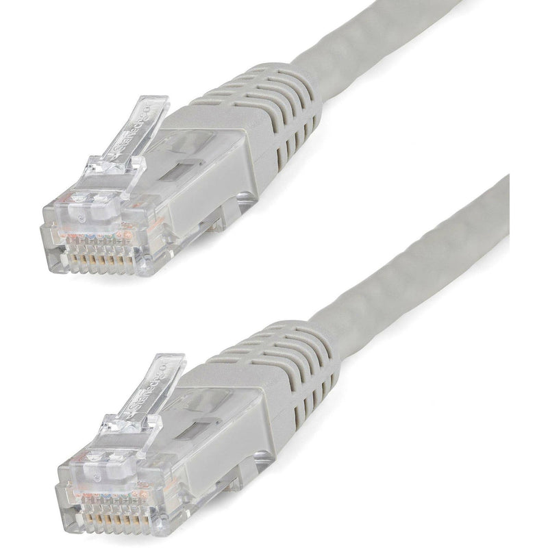 Close-up view of gold-plated RJ-45 connectors on gray Cat6 ethernet cable showing transparent housing and internal wiring