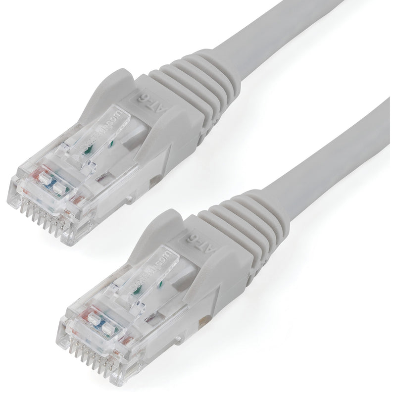 Close-up view of gold-plated RJ45 connectors on gray Cat6 ethernet cable showing snagless design and internal wiring