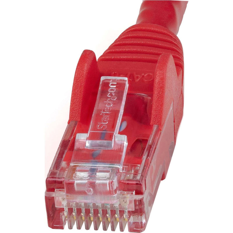 Detailed macro shot of red Cat6 cable snagless boot and RJ45 connector construction