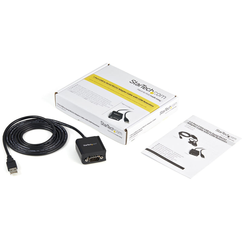 Complete package contents of StarTech.com USB to serial adapter including cable, manual, and box