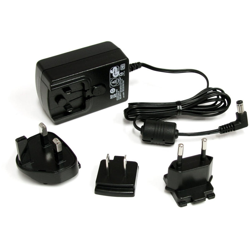 StarTech.com universal power adapter with multiple international plug attachments and power cord displayed