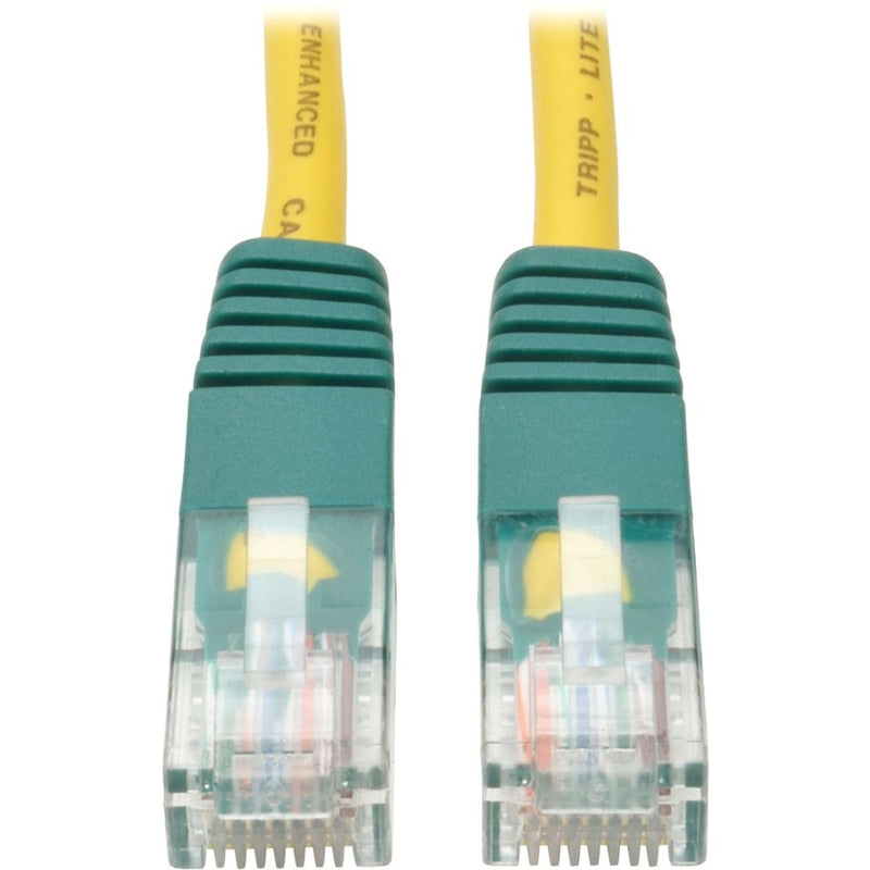 Close-up of Tripp Lite Cat5e crossover cable showing green molded RJ-45 connectors with transparent housing and yellow cable jacket