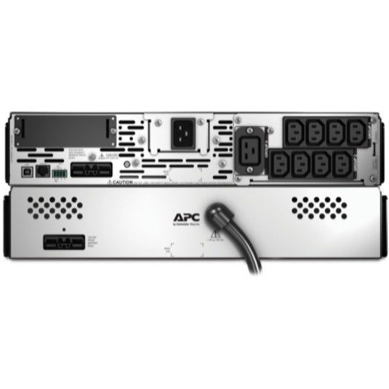 Detailed view of APC Smart-UPS power management system and battery connections