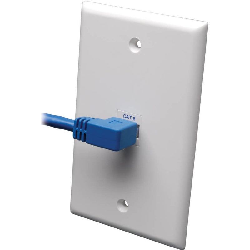 Demonstration of Cat6 cable connected to white wall plate showing space-saving angled design