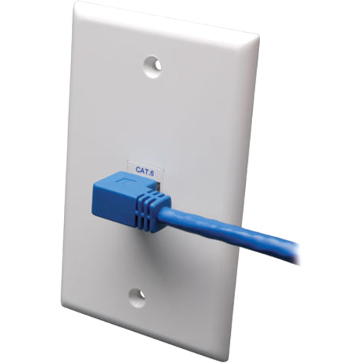 Side view of right-angle Cat6 cable connected to wall plate showing minimal protrusion