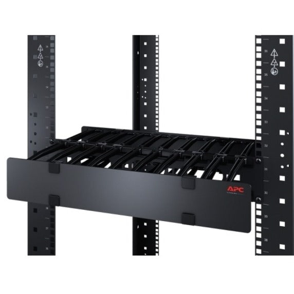 Side angle view of APC cable manager mounted between rack posts showing mounting compatibility