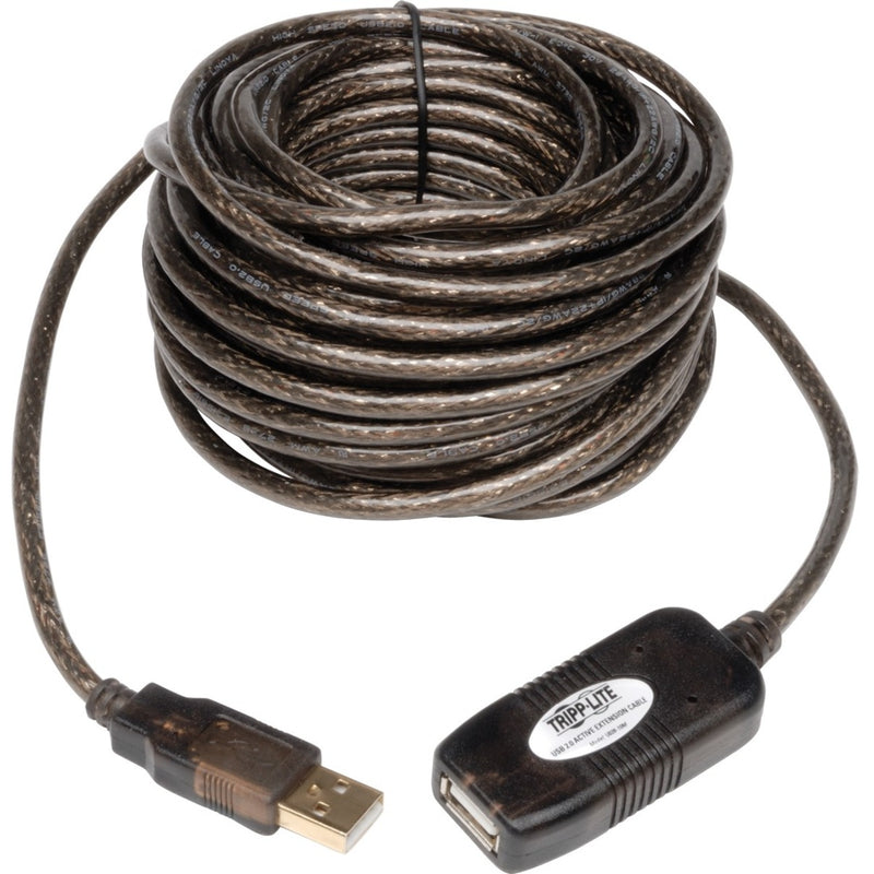 Close-up view of Tripp Lite USB extension cable showing coiled arrangement and signal booster unit