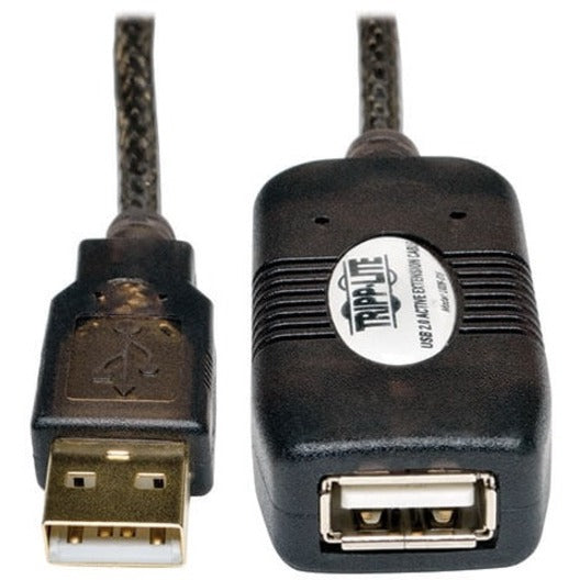 Detailed view of USB Type-A connectors and signal booster unit of Tripp Lite extension cable