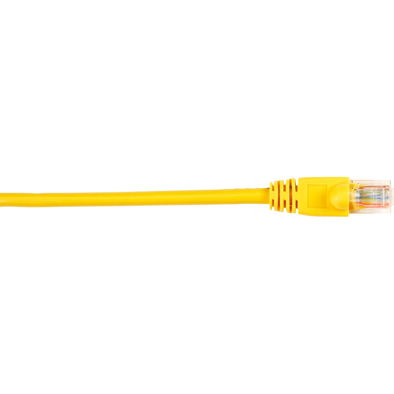 Yellow Cat5e ethernet patch cable with snagless boot and RJ-45 connector close-up view