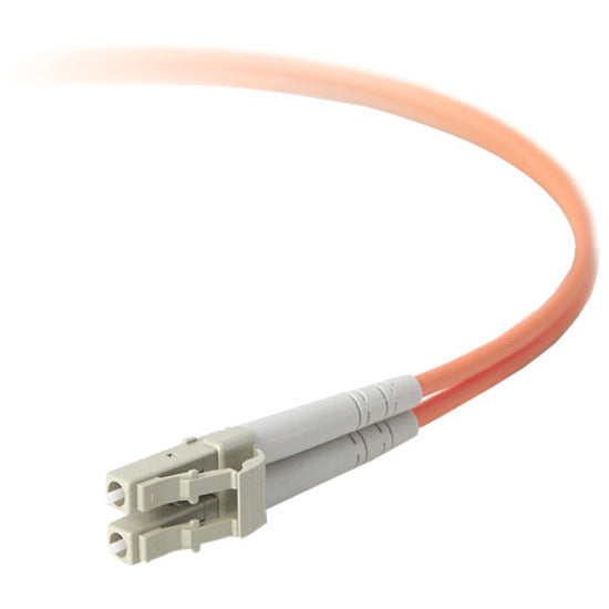 Close-up view of Belkin fiber optic cable LC connector end with aqua-colored cable jacket