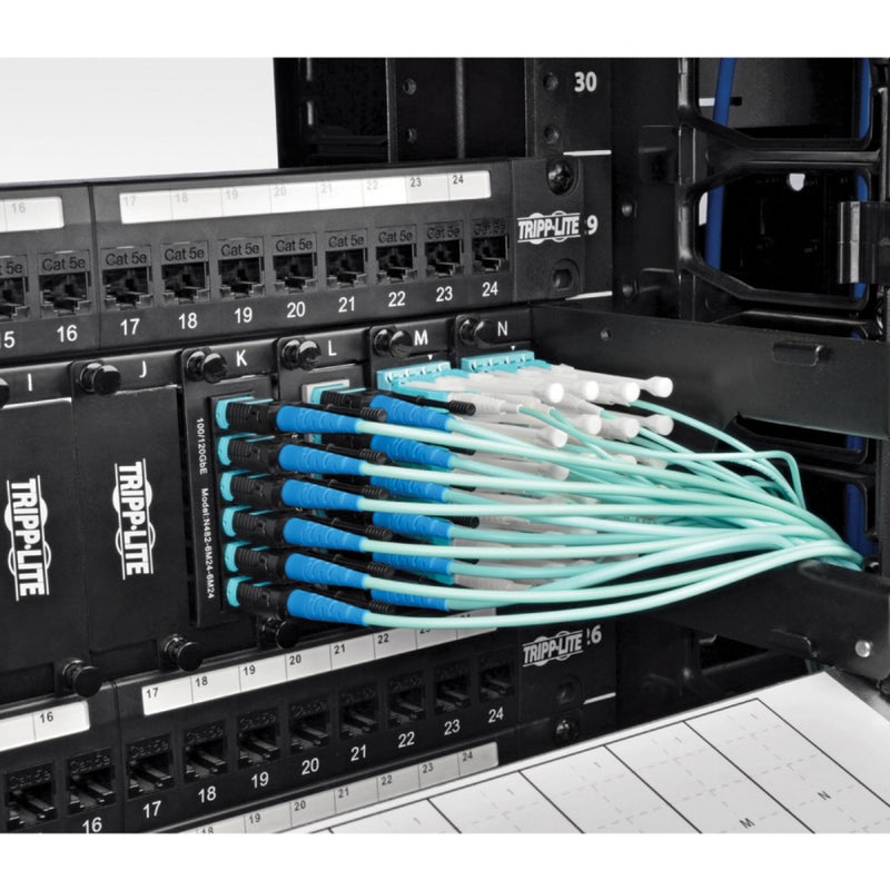 Multiple MTP/MPO fiber cables installed in a data center rack showing organized cable management