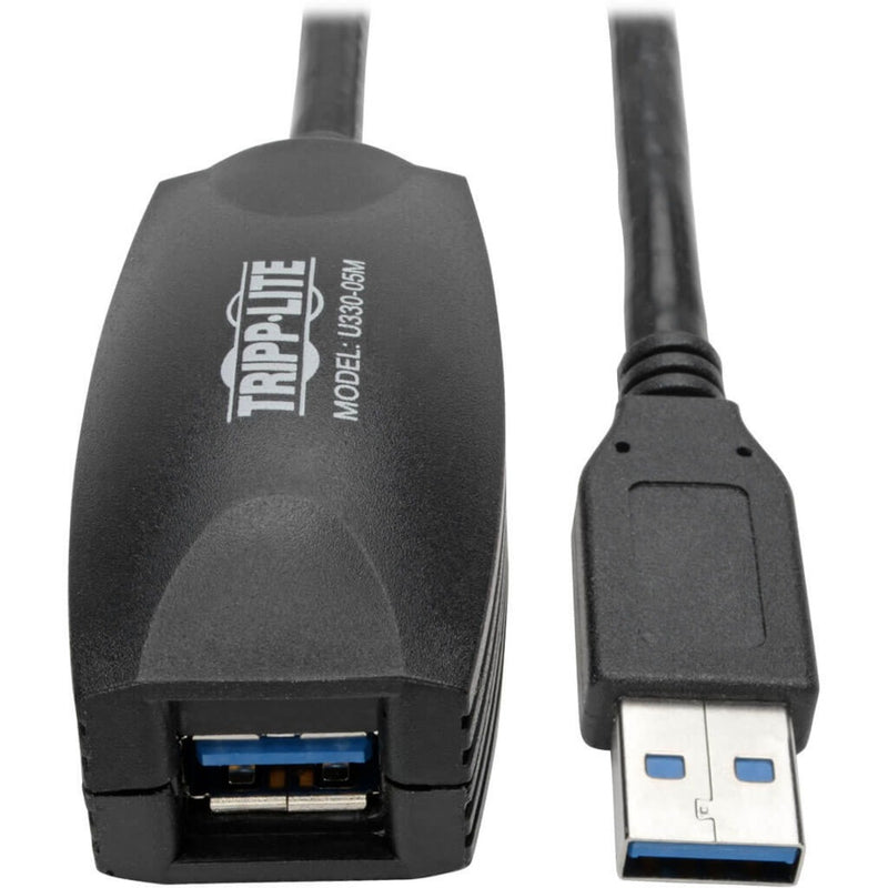 Close-up view of Tripp Lite U330-05M USB 3.0 active extension cable connectors showing male USB-A and female USB-A ports with signal booster housing