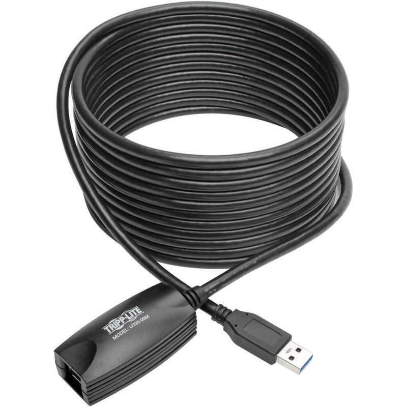 Full length view of coiled Tripp Lite U330-05M USB 3.0 active extension cable showing flexible gray cable construction