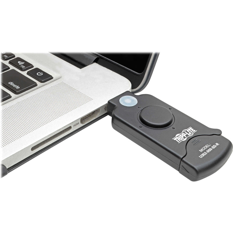 Tripp Lite SD card reader connected to a laptop USB port