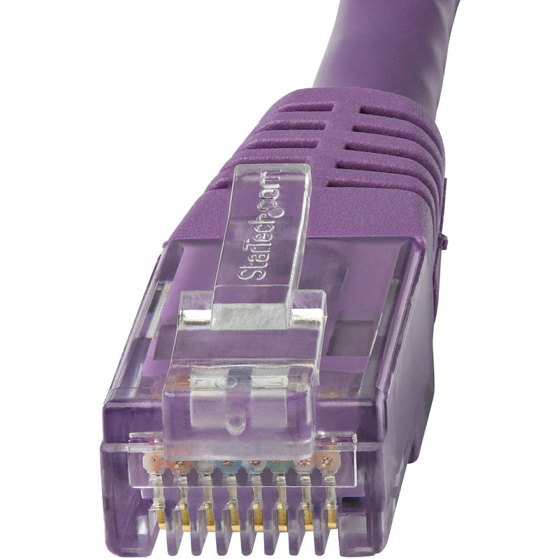 Macro shot of purple Cat6 cable connector showing strain relief design and internal wiring