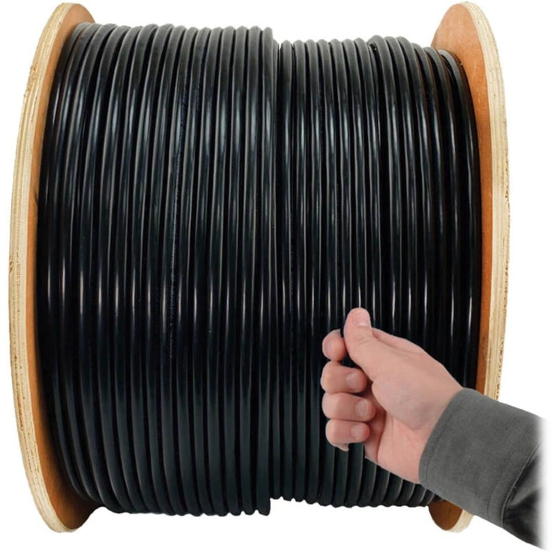 Close-up of Cat5e cable being pulled from wooden spool showing jacket durability