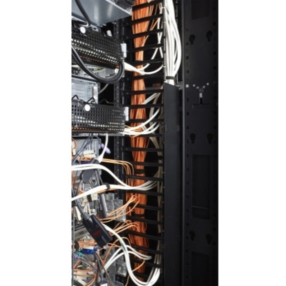 Close-up of organized cable management system with multiple cable runs