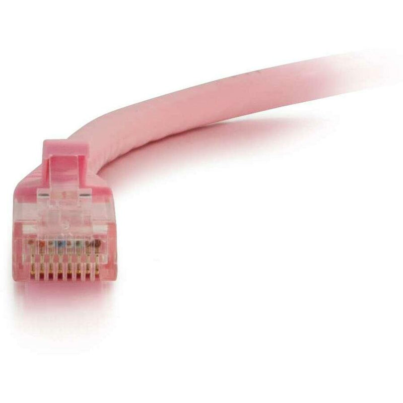 Detailed view of pink Cat6 cable RJ-45 connector showing internal wiring and contact pins