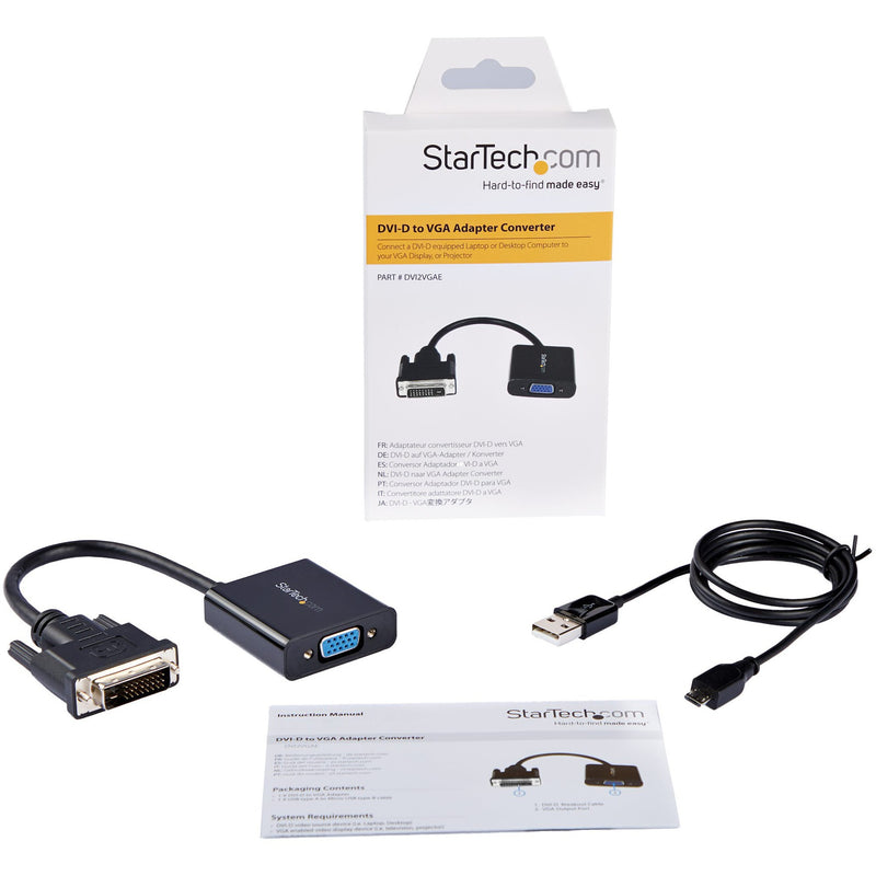 Complete package contents of StarTech.com DVI-D to VGA adapter including converter, USB cable, and manual